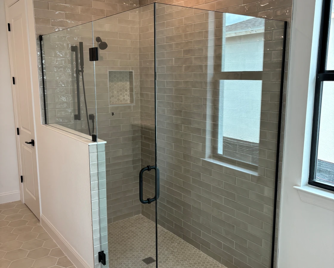 Spacious shower with glass door